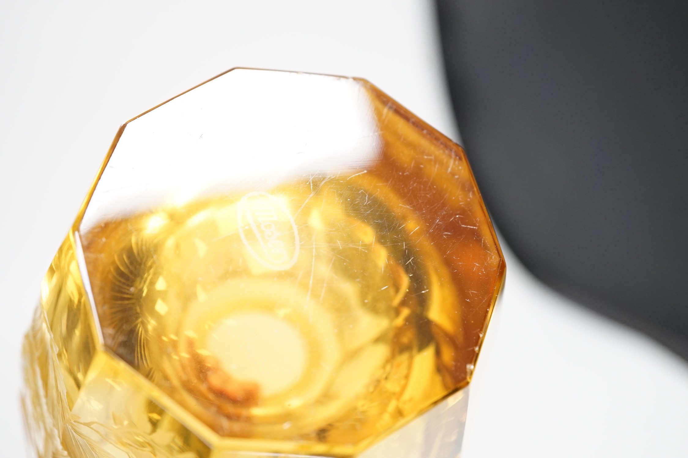 A Moser wheel engraved amber glass vase, 22cm
